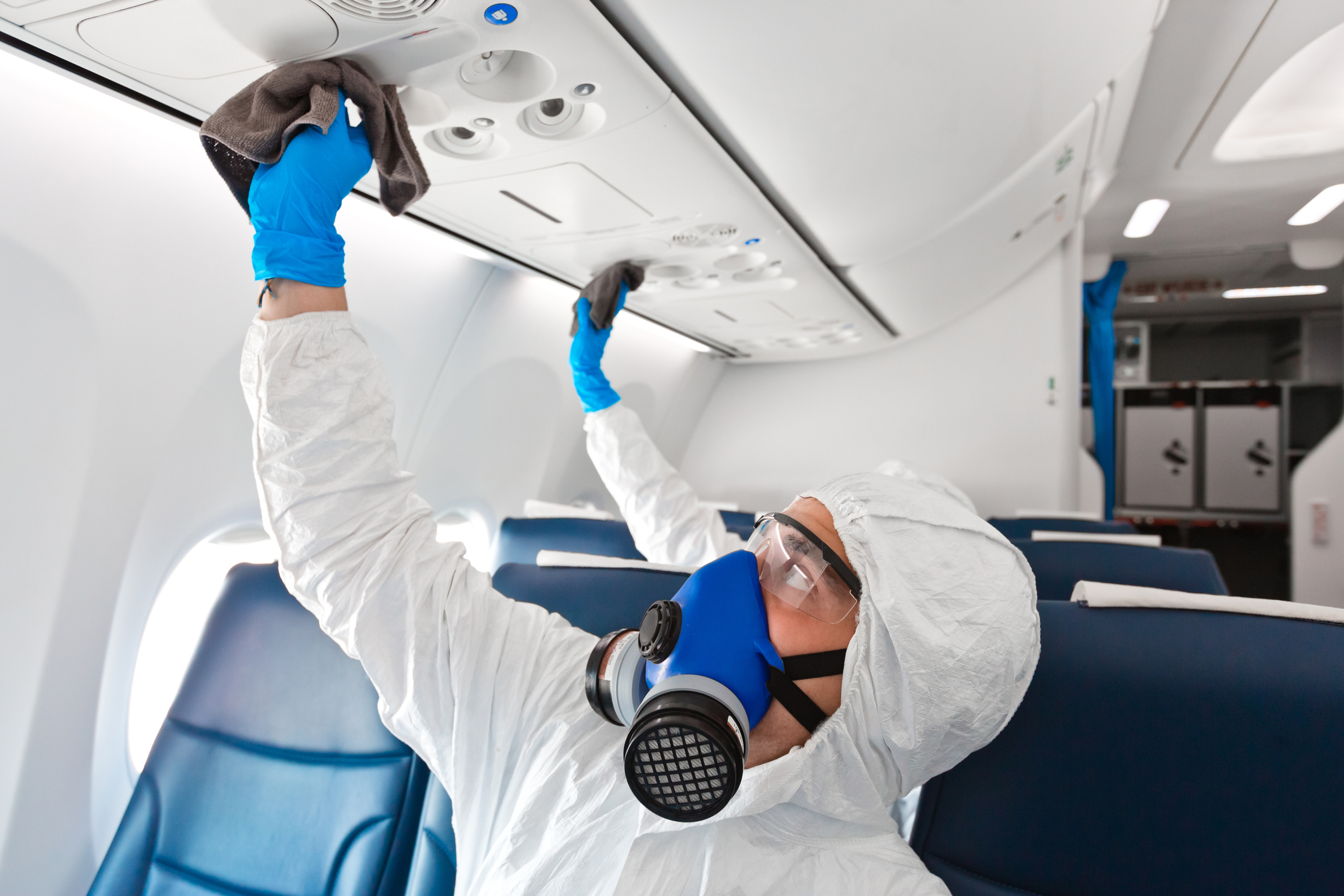 Aircraft cleaning in a protective suit