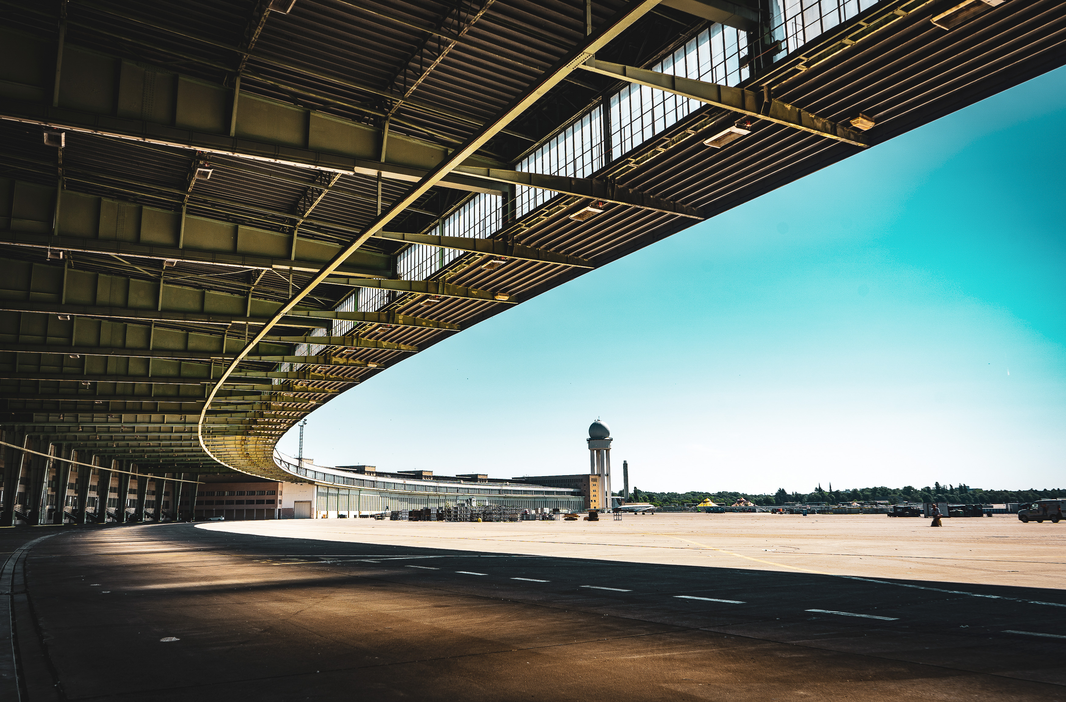 The main building and part of the former airfield of Berlin Tempelhof Airport in sunshine.