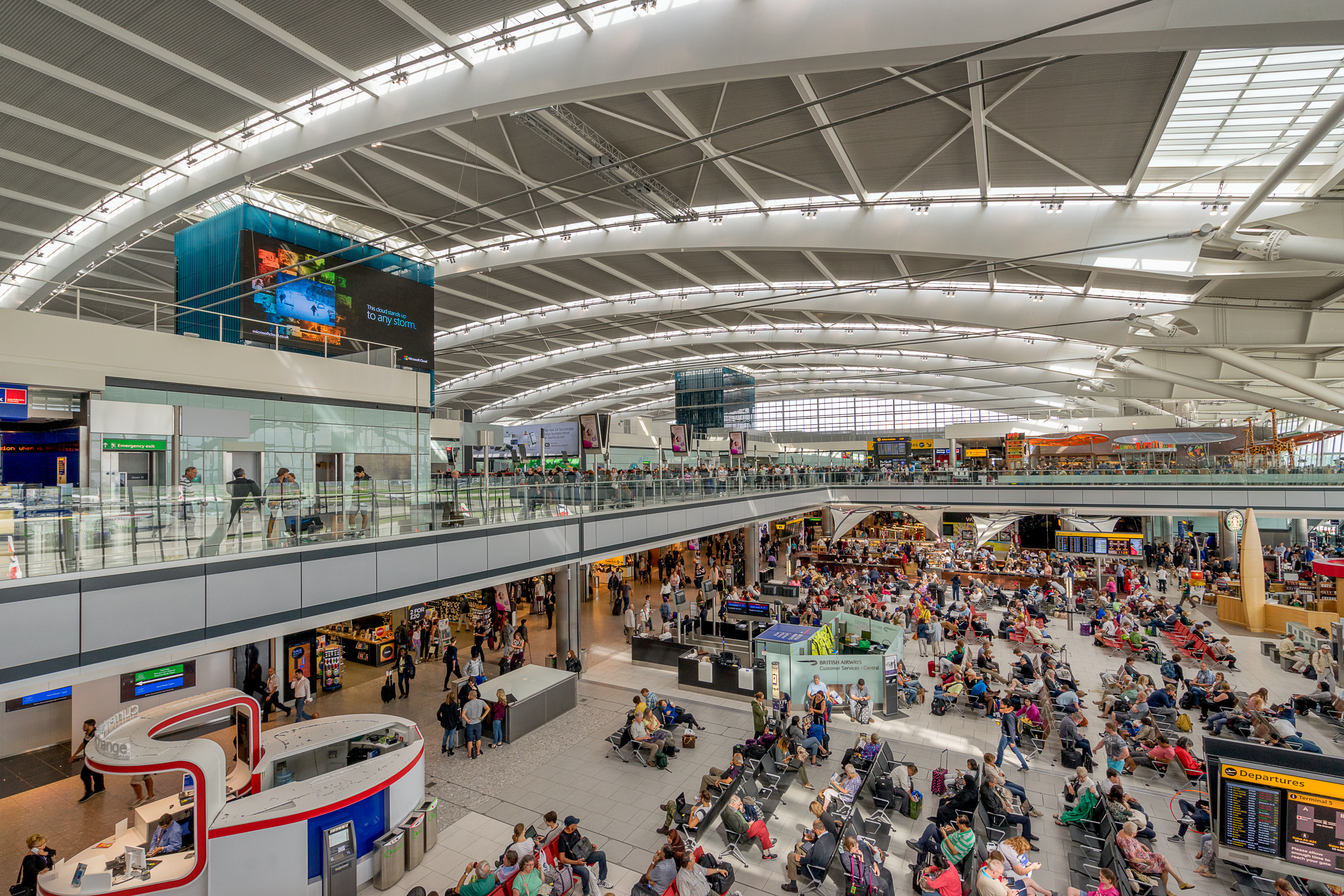 A busy departure lounge at London Heathrow Airport.