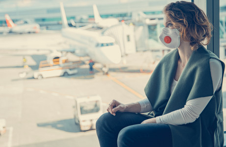 Woman with mask at the airport