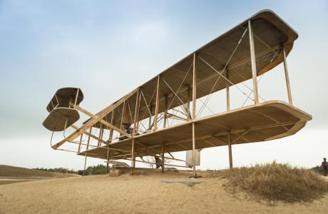 A reconstruction of the Wright Flyer I on one of the test hills.