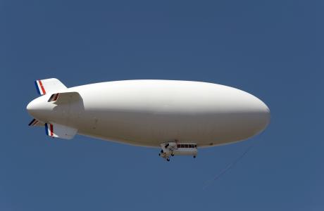 A Zeppelin in a sunny sky.