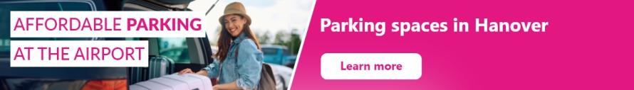 Image of a cheerful woman near a car, with a clickable link to the Hanover location.