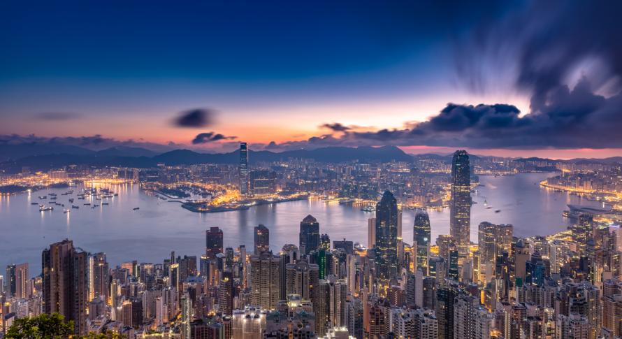 The skyline of Hong Kong at dusk.