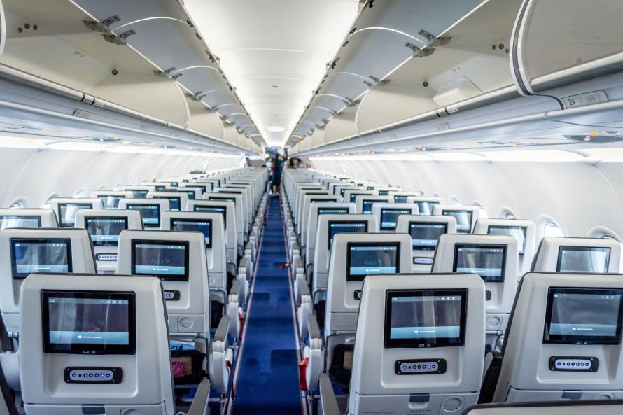 The cabin aisle of an Airbus A320.